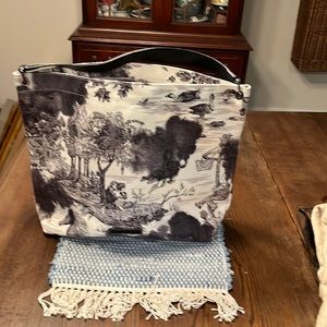 Longchamp canvas hobo bag with classic toile de jouy black and white pattern